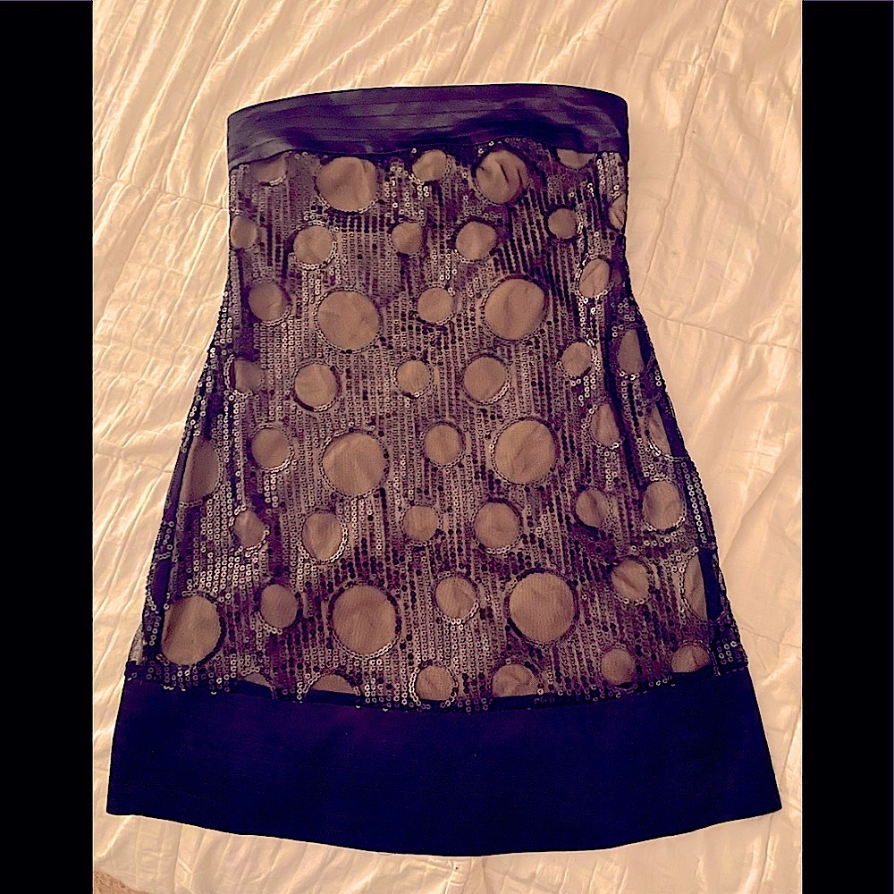 Black cocktail dress, strapless, above knee